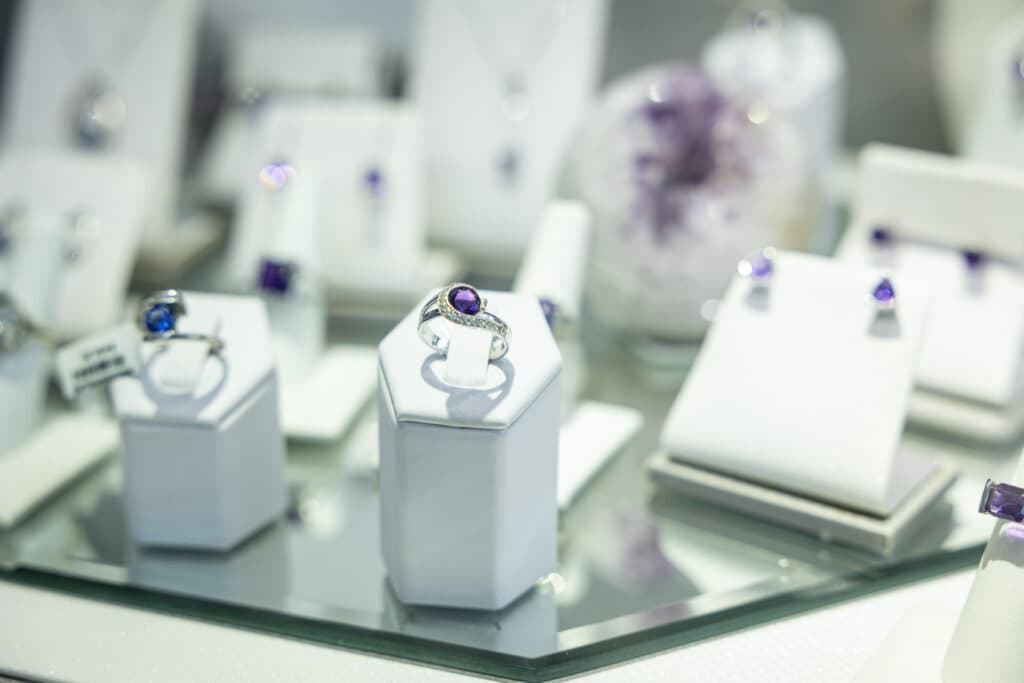 Frank Reubel fine jewelry rings and earrings at Plant Riverside District Savannah