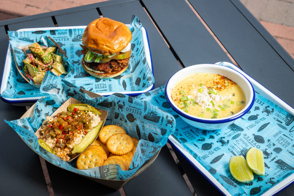 Crab cake BLT and house smoked fish dip at District Seafood, Plant Riverside District