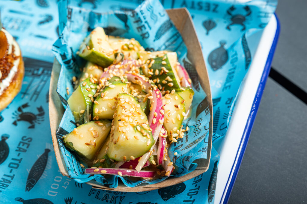 Crushed cucumber salad side at District Seafood, Plant Riverside District