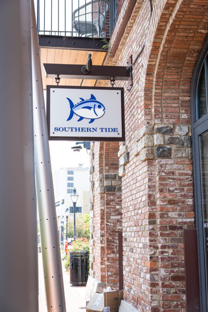 Southern Tide sign at shopping strip of riverwalk at Plant Riverside District