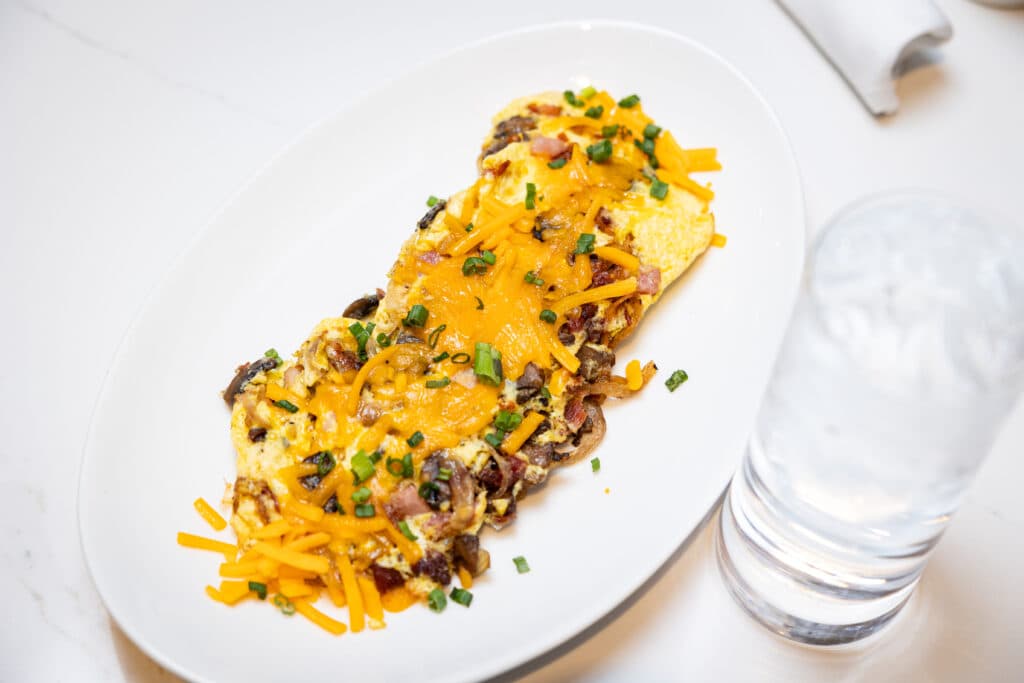 Plated Omelet with ice water at Turbine Market + Cafe Savannah