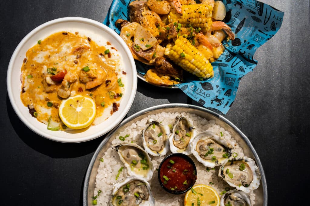 Oysters and low country boil and shrimp and grits at District Seafood at Plant Riverside District Savannah