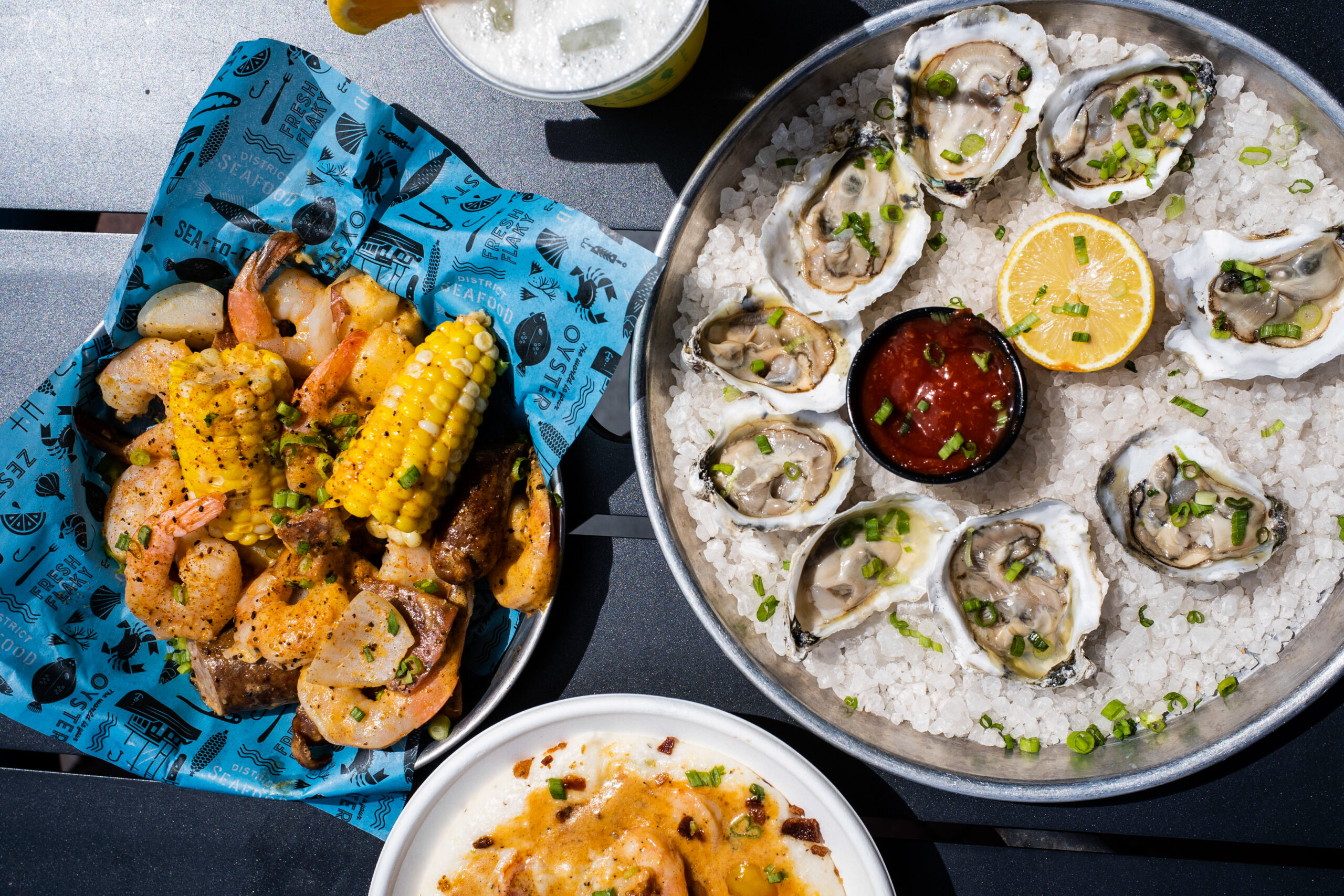 Oysters, low country boil, and shrimp and grits at District Seafood at Plant Riverside Savannah