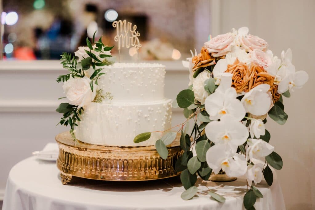 Wedding cake with flowers at JW Marriott Plant Riverside District Savannah